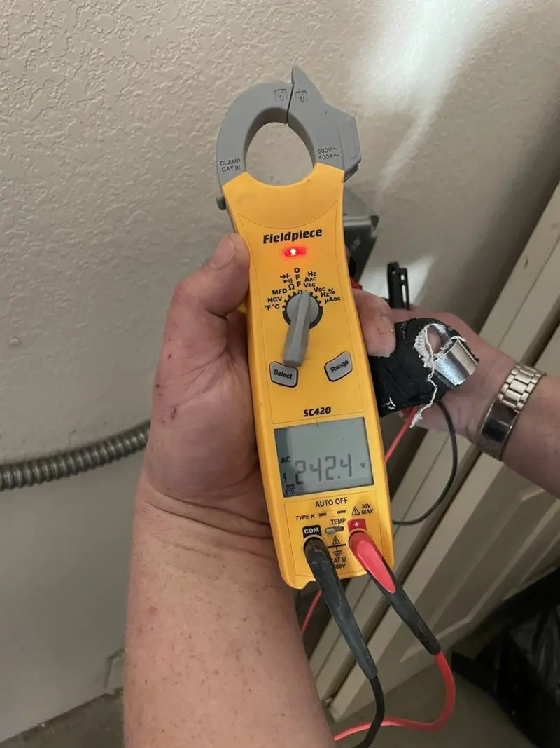 Voltage testing with clamp meter during Electrical Installation Services in Perry Hall